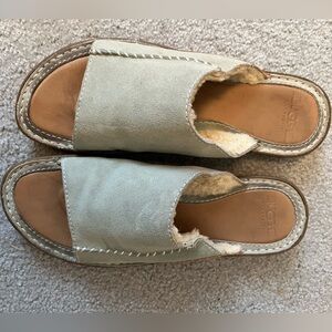 UGG suede Sherpa-lined sandals.  Women’s size 12.  Excellent condition!